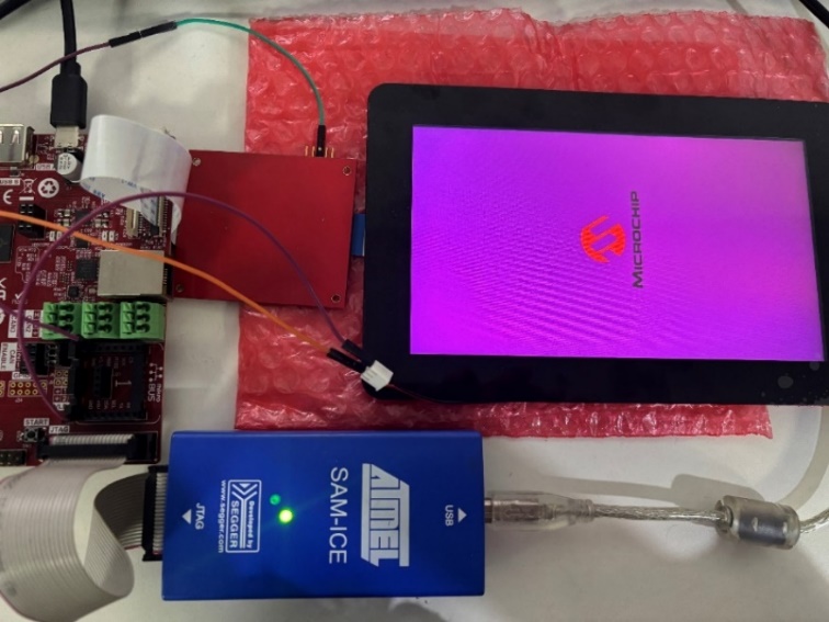 A device with wires and a blue box AI-generated content may be incorrect.